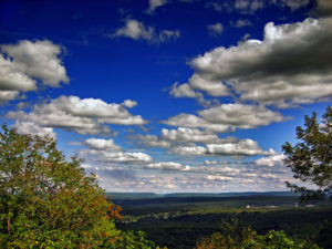 Mount Pocono, Pennsylvania. Vivid blue sky with fluffy white clouds.
