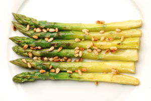 Asparagus with pine nuts and sauce