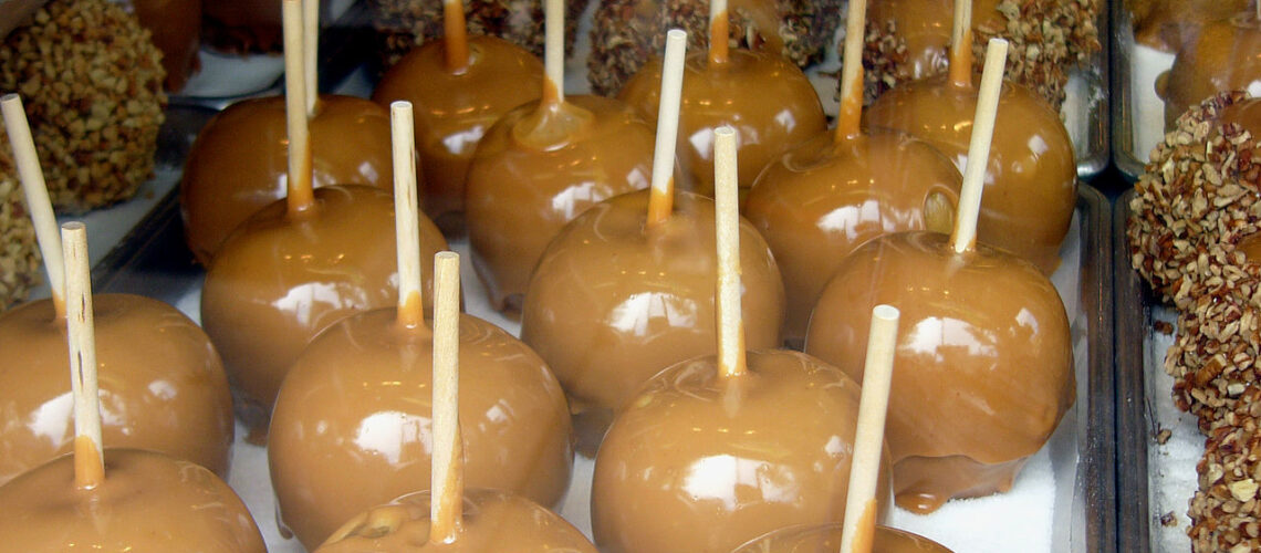 Caramel apples: plain and with peanuts.